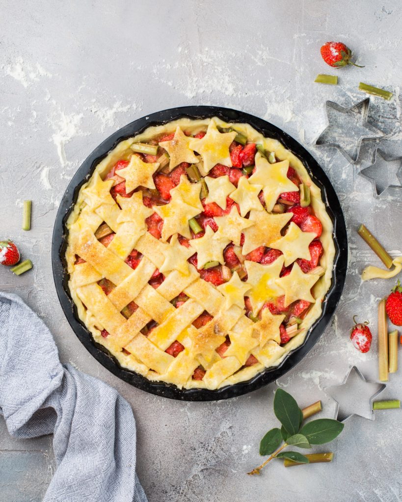 A strawberry pie with star shaped crust