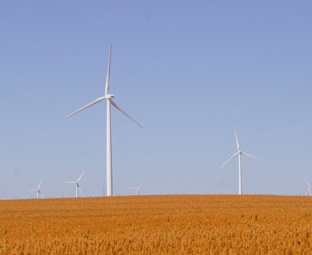 Giant windmills in a field