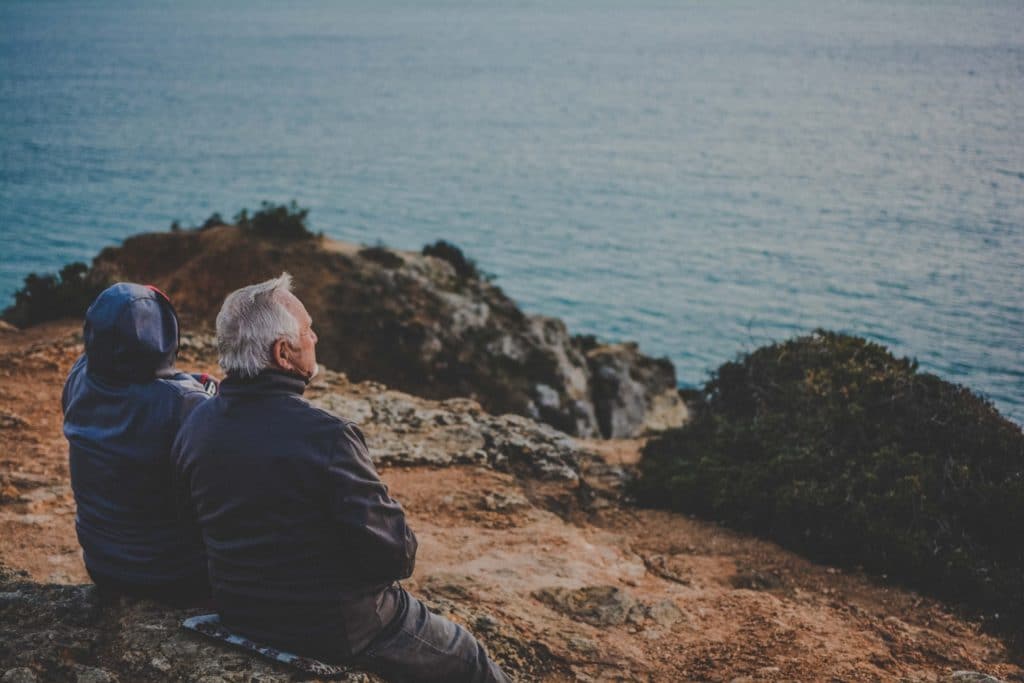 older couple looking out at the water