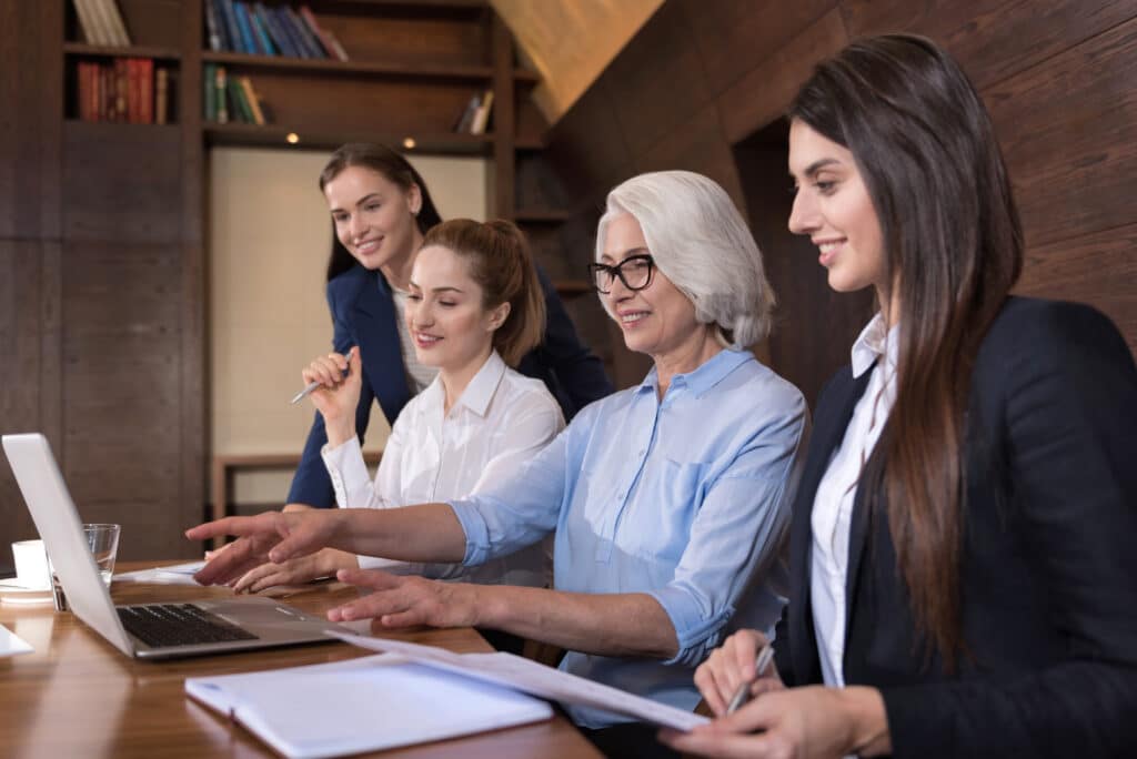 Insurance professionals working on a project together