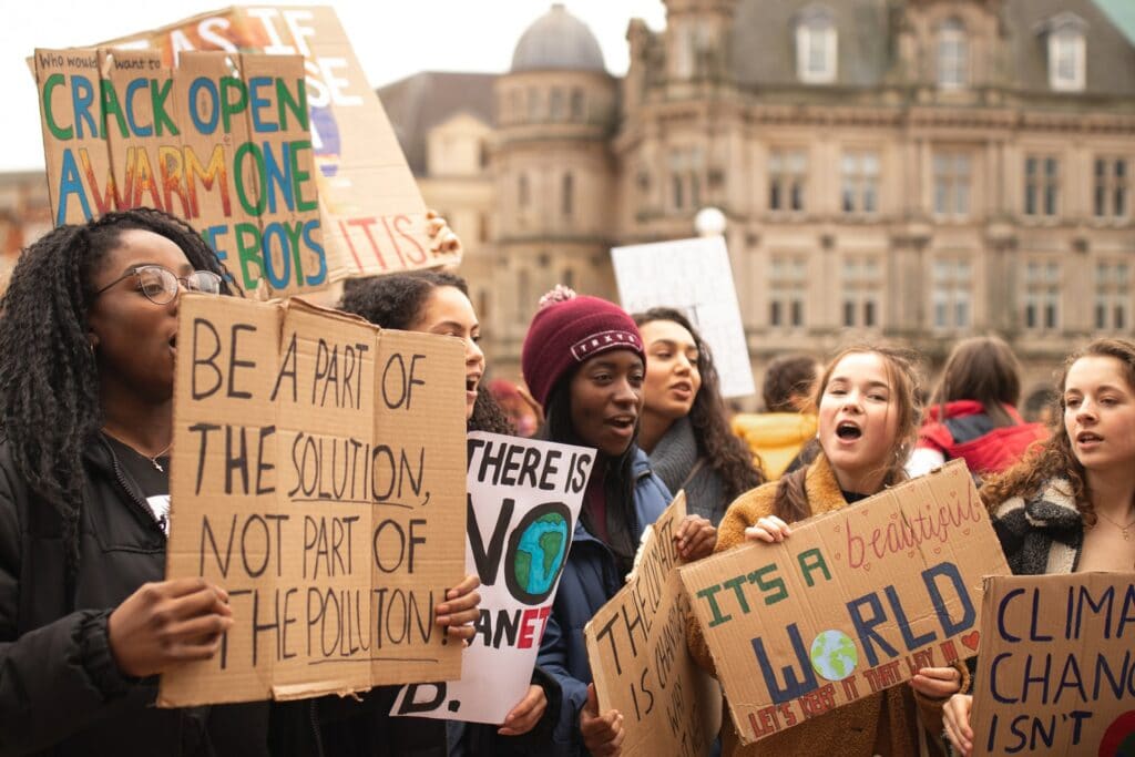 Protesters holding signs