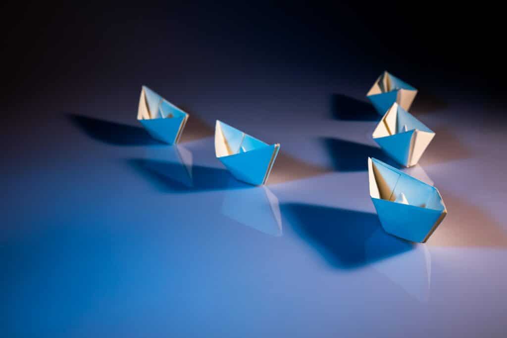 paper boats on a table