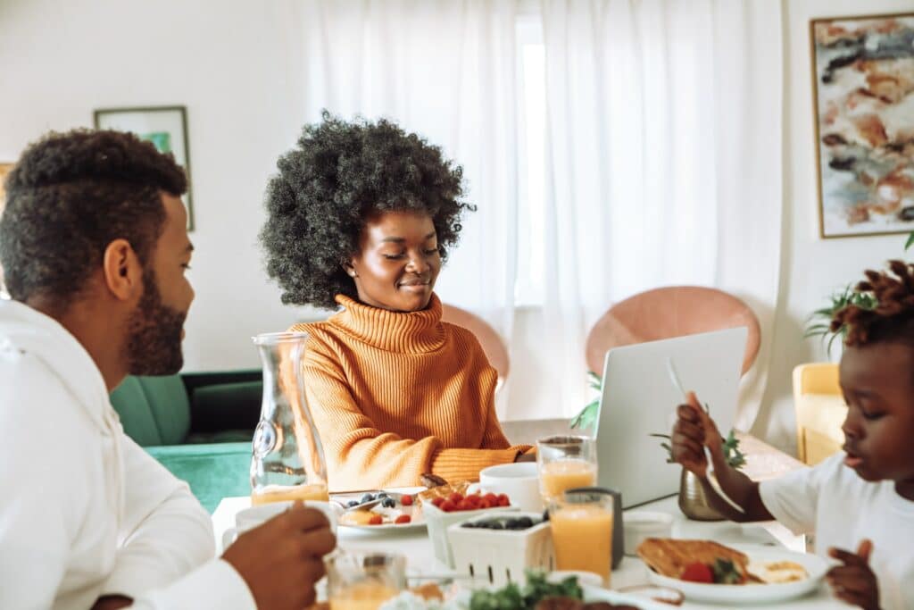 Family having breakfast together.