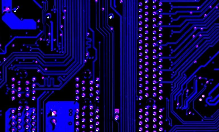 Computer circuit board emphasizing the need for increased cybersecurity in the insurance industry.