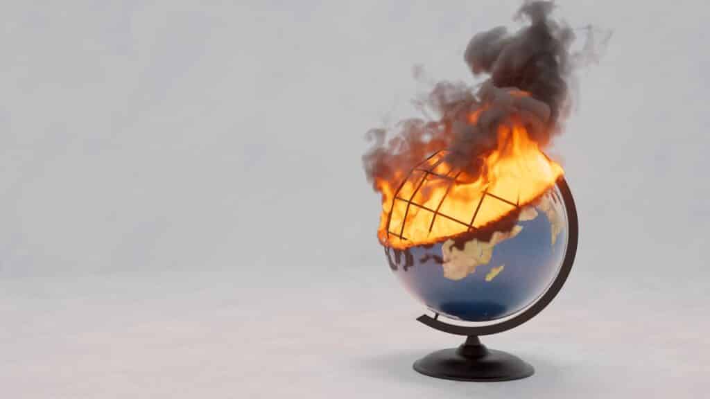 A model globe is aflame