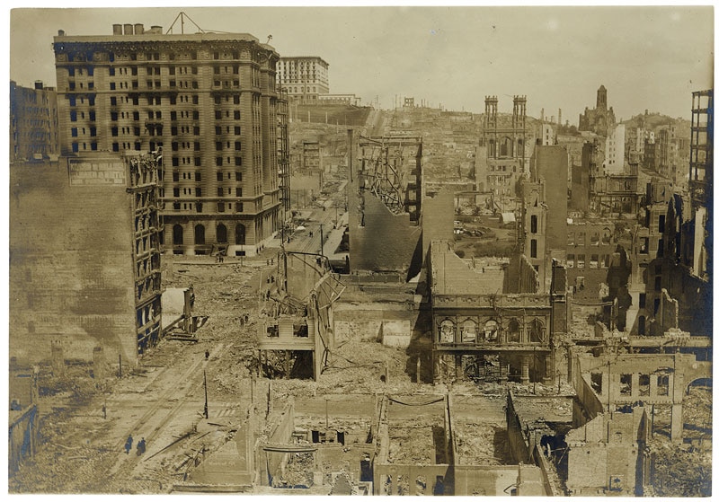 San Francisco Earthquake, 1906. St. Francis Hotel, Fairmount Hotel in distance showing clean sweep of fire in business section of all except class A steel frame buildings.