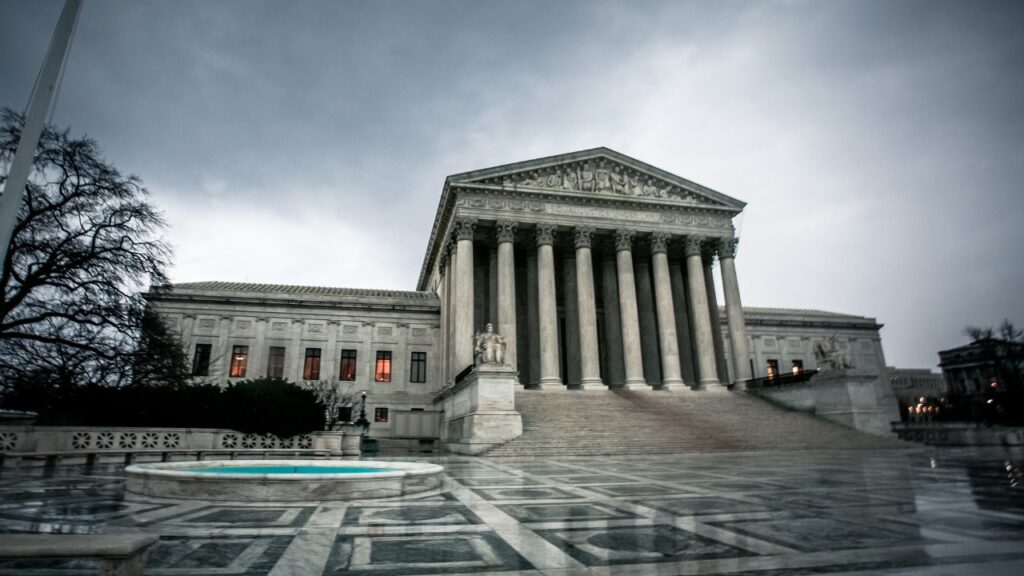 U.S. Supreme Court building on a gray, rainy day