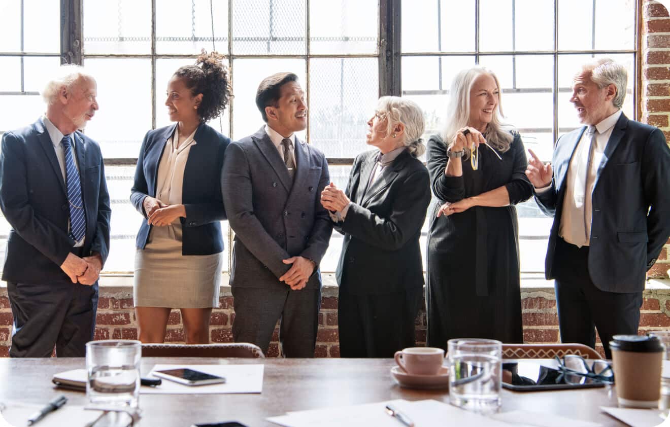 Decorative Image: Insurance professionals talking to one another